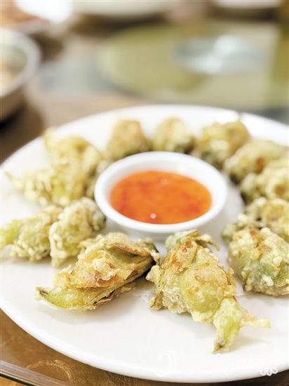 梁記山莊推出的應(yīng)季菜式“炸禾雀花”。